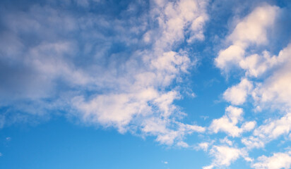 Wall Mural - sky background. blue evening sunset sky with clouds.