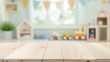 © zetrum - Over a blurry background of a children's room filled with toys, there is a wooden table. Presentation of a product display