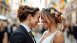 © Lens Legacy - Two newlyweds, one dressed in a floral headpiece, stand outdoors under colorful decorations, joyfully sharing a tender and loving moment on their special wedding day.
