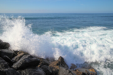 waves on the water of a summer beach