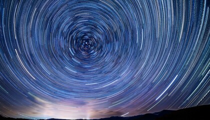 Wall Mural - Star trails in a dark sky