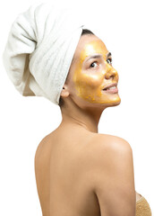 Wall Mural - Beauty portrait of woman in white towel on head with gold nourishing mask on face. Skincare cleansing eco organic cosmetic spa relax concept. A girl stands with her back holding an orange mandarin.