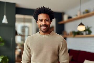 Canvas Print - Portrait of a blissful afro-american man in his 30s dressed in a warm wool sweater in crisp minimalistic living room