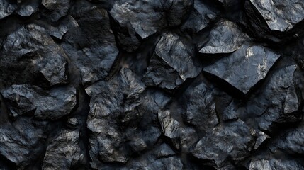 Wall Mural - dense composition of dark rocks creating an abstract and textured natural background, ideal for desi