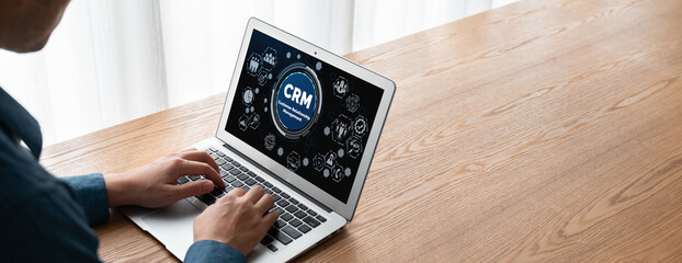 Wall Mural - customer relationship management system on modish computer for crm business and enterprise