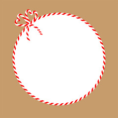 Wall Mural - Square craft brown background with candy cane ribbon. Christmas packing string for decoration and present