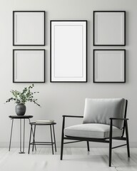 A minimalist living room with a gray armchair. two end tables. a plant. and five black picture frames on the wall