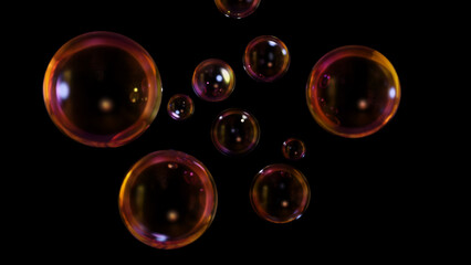 Wall Mural - abstract floating circles with space on a black background. a 3d-colored sphere with a color spectru