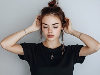 A woman with a black shirt and brown hair