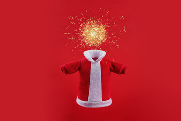 Bengal fire and Santa Claus's fur coat  on a red background for Christmas holidays