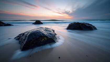 Wall Mural -  Epic Sunset Calm Waters and Rocks at the Beach