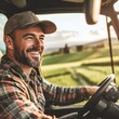 © Gromik - Farmer Smiling While Driving Tractor in Field