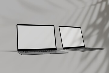 Laptop with blank empty white screen display mock-up, isolated on grey background