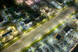 © bilanol - Traffic rush at shopping malls and small businesses in evening time in North Port, Florida. USA transportation and retail infrastructure concept