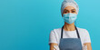 © Andres Mejia - Female chef wearing surgical mask and gloves posing with crossed arms