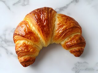 The croissant flaky and buttery, with a perfectly crisp exterior and a soft, layered interior.