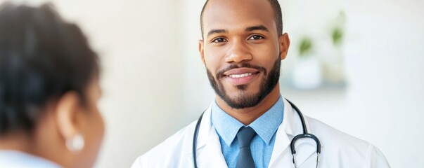 confident male doctor in white coat smiles warmly at patient, showcasing professionalism and care in bright medical setting