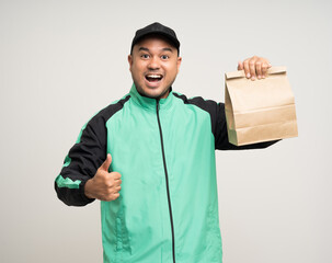 Young asian rider wearing green jacket uniform various action holding paper parcel box delivery to customer. Delivery man service worker Courier and shipping parcel cardboard service.