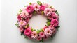 © Kingphet - Flower composition wreath made of pink flowers in forced perspective