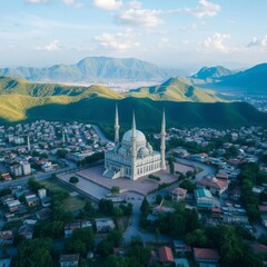 Aerial view of grand mosque, white domed architecture, minaret towers, sprawling city, lush green hills, distant mountains, blue sky with wispy clouds, Turkish landscape, dramatic perspective, high re