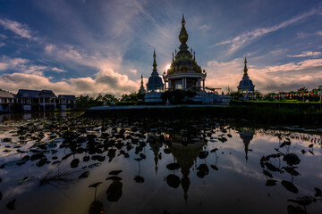 The background of an important tourist attraction in Khon Kaen Province (Wat Thung Setthi) is a large pagoda in the middle of a swamp, tourists always come to see the beauty in Thailand