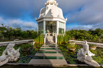 Wall Mural - The background of an important tourist attraction in Khon Kaen Province (Wat Thung Setthi) is a large pagoda in the middle of a swamp, tourists always come to see the beauty in Thailand