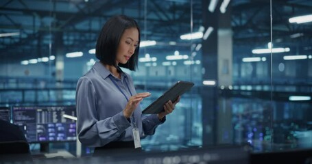 Poster - Diverse Multiethnic Young Woman Looking at Camera and Smiling. Portrait of an Asian Female Data Engineer Working on a Tablet Computer, Standing in a Modern Data Center with Server Systems