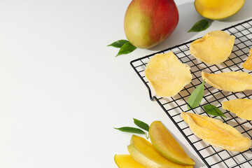 Wall Mural - Dried mango chips with fresh sliced mango