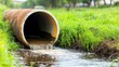 © ACE STEEL D - Rusty Pipe Discharging Waste Water into Ditch