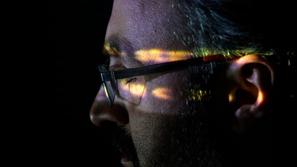 focused coder analyzes code on computer screen in dark environment - cyber security, cyber attack, p