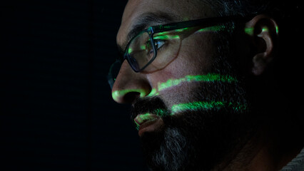 focused coder analyzes code on computer screen in dark environment - cyber security, cyber attack, p