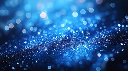 Abstract blue background with bokeh lights and copy space, featuring shiny bokeh effect
