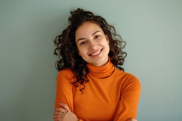 Wall Mural - A woman wearing an orange turtle neck sweater