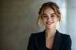 © Imagentive - Smiling Young Executive Woman with Freckles in Trendy Blazer