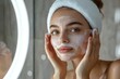 © Rahul - facial skin care routine concept. young woman looking in the mirror during washing her face with facial foam, Generative AI