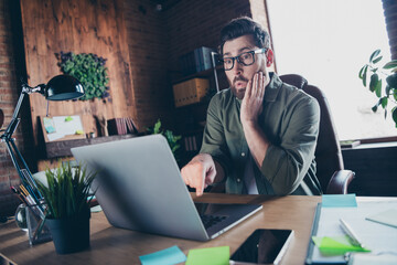 Photo of funky shocked leader dressed shirt reading news modern gadget indoors workstation workshop