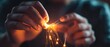 © TPS Studio - A person holds glowing threads, creating an enchanting display of lights and sparks, symbolizing creativity and innovation in a dark setting.