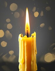 Burning candle with dripping or flowing wax