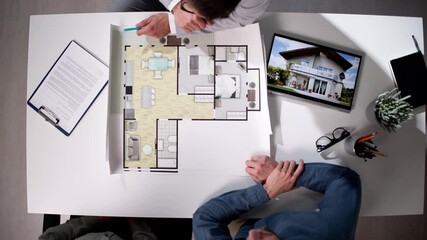 Wall Mural - Real Estate Consultant Showing Apartment Blueprint