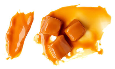 Caramel candies isolated on white. Caramel fudges flowing in  milk  caramel butterscotch sauce  Top view. Caramel smear Flat lay