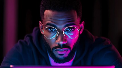 Man wearing glasses looking at laptop screen Minimalist White Background with Space for Text