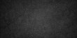 © armans - Distressed rough black grunge cracked wall slate texture. Chalk board and Black board grunge backdrop background. Wall grunge backdrop rough background dark black and stone.