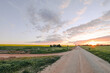 © Austockphoto - sun setting on country road in Central Victoria, Australia. Late afternoon in Australia. Landscape