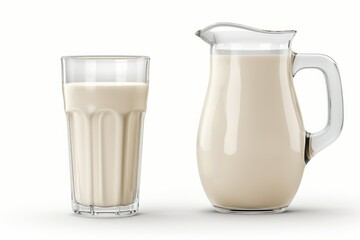 Natural whole milk in a jug and a glass isolated on a white background closeup