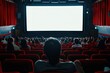 © Isuru - Red chairs  blank screen  silhouettes watching movie in cinema.