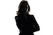 © Isuru - one caucasian business woman arms crossed portrait in silhouette on white background