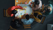 © Summit Art Creations - Top view of people writing and making scrum task board while writing marketing and planning strategy at colorful sticky notes. Smart team manage work performance by using kanaban board. Convocation.