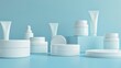 © vefimov - Variety of skincare products, cosmetics and samples on a blue background. Includes different packaging types like pumps, jars and tubes.
