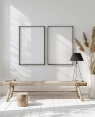 Two blank frames, wooden bench, a woven basket and a palm plant in a white room with sunlight streaming through the window