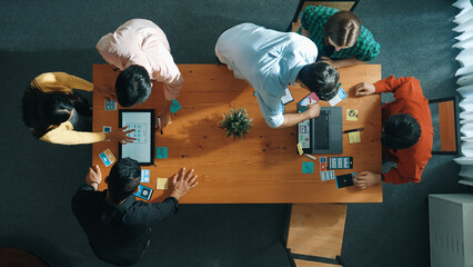 Wall Mural - programmer sharing ux ui design for mobile phone interface idea with software developer at meeting w